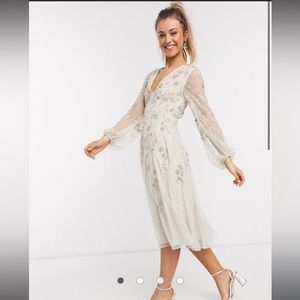 midi dress with blouson sleeve and delicate floral embellishment